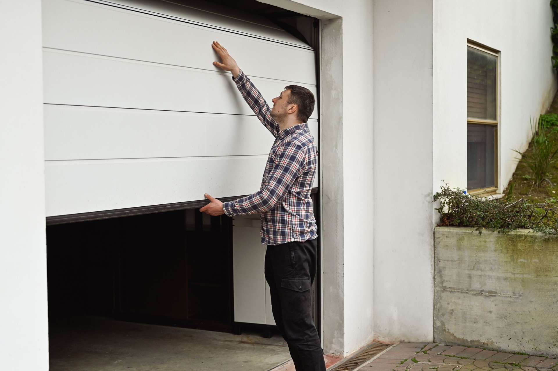 Repairing garage doorway.