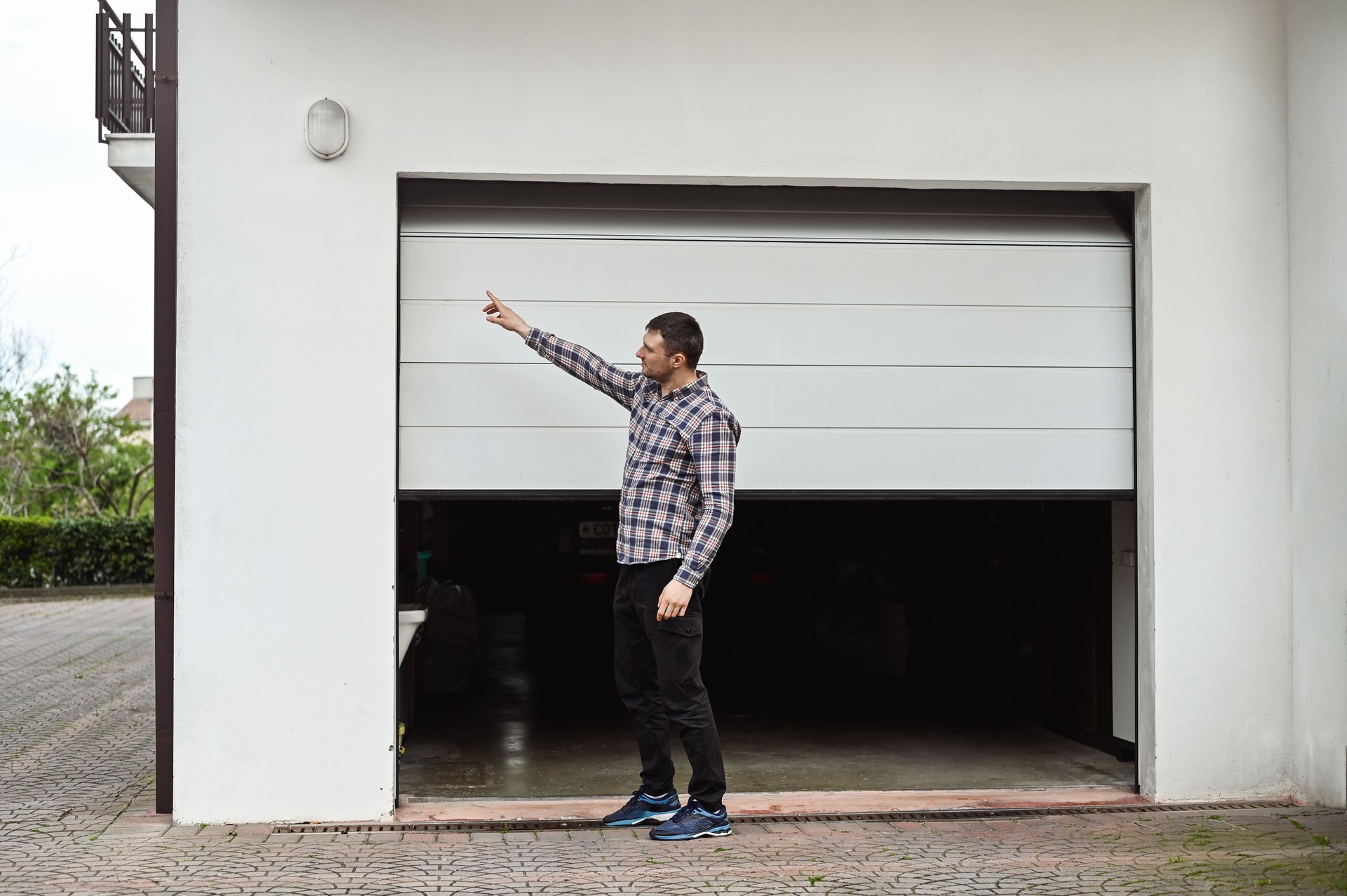 Man repairing garage.